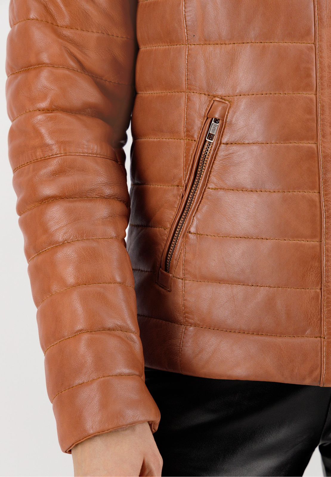 Tan leather jacket detail
